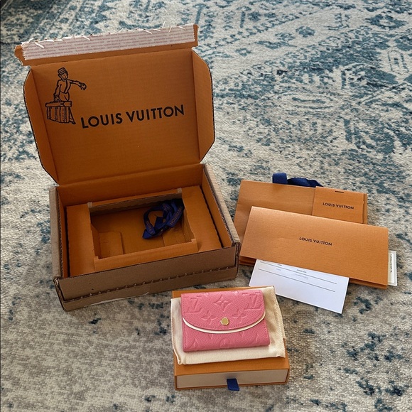 Louis Vuitton Handbags - NWT Louis Vuitton Rosalie Coin Purse in Tender Bliss